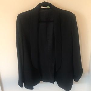 Women’s black tuxedo blazer.